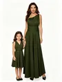 Foto de estudio de vestidos a juego verde oscuro para madre e hija para eventos - Verde Militar