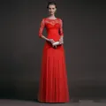 Detailed view of an elegant red lace evening gown with sheer long sleeves and a pleated skirt. - S / Top And Bottom / Red