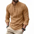 Detail view of camel cotton linen Henry shirt with lace-up collar and rolled sleeves - Earthy Yellow