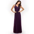 Élégante robe maxi bandage convertible violet foncé présentée dans un décor de studio. - Violet foncé