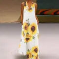 Bohemian sleeveless maxi dress with vibrant sunflower print and V-neckline - S / Bottoms / White