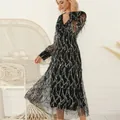 Elegant black V-neck dress with silver sequins and tassel hem for evening parties - XS / Tops / Black