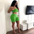 Vibrant neon green two-piece athletic set with tube top and high waist shorts for women - S / Top And Bottom / Green