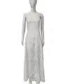 Detailed view of a white floral strap maxi dress on a mannequin for beach vacation - S / Tops / White