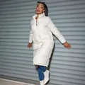 Stylish long white winter puffer coat with zipper and quilted design for women. - M / Tops / White
