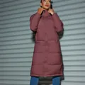 Stylish maroon long puffer coat for women featuring a full zipper and warm quilted design - M / Tops / Brown Red