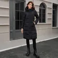 Elegant women's slim fit long hooded black puffer coat designed for extreme winter warmth - S / Tops / Black
