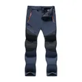 Pantalones de senderismo impermeables para hombre en azul marino con detalles naranjas - L(EU S) / Bottoms / Estilo de Lana Gruesa / Azul