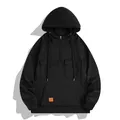 Detalle de la sudadera negra pesada para hombre con capucha, bolsillos y media cremallera. - S / Tops / Negro