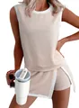 Detailed view of women's beige ribbed sleeveless top and matching shorts with white trim - S / Top And Bottom / Pink