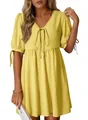 Detail of yellow V-neck dress featuring lace-up puff sleeves and soft pleated fabric. - S / Yellow