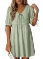 Detail view of a sage green V-neck puff sleeve dress with tie-front and textured fabric - S / Light Green