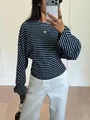 Detailed view of stylish black and blue striped batwing sleeve t-shirt for women - S / Tops / Blue Stripe