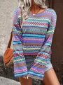 Close-up view of the vibrant colorful zig-zag pattern on a loose knit long sleeve top. - S / Tops / Purple