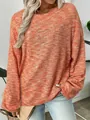 Detail view of colorful waffle knit long sleeve T-shirt showing texture and loose fit - S / Tops / Orange