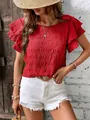 Close-up of a red smocked texture top featuring double layer flutter sleeves style. - Red
