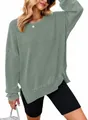 Saliegroene wafelgebreide sweatshirt met ronde hals en zijsplitten voor dames mode - Groen