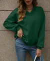 Detail shot of a women's dark green V-neck fleece sweatshirt with a loose casual fit - Green