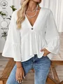 Detail view of white cotton V-neck top with ruffled bell sleeves for women - S / Tops / White