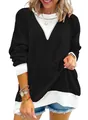 Detailed view of the black and white color-block waffle knit sweatshirt on a model - Black
