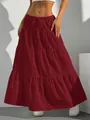 Close-up detail of burgundy tiered bohemian maxi skirt showing the rich fabric texture - Burgundy