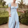 Close-up of a blue floral square neck maxi dress with puff sleeves and front slit details - S / Top And Bottom / Sky Blue Floral