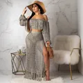Detail shot of boho mesh two-piece beach set featuring fringe trim and high slit skirt - Gray