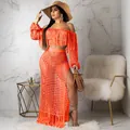Vibrant orange crochet mesh beach two-piece set featuring tassel details and high slit - Orange