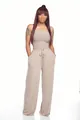 Vue détaillée d'une combinaison bustier beige à jambes larges et taille à cordon coulissant. - Abricot