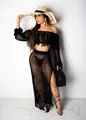 Detailed view of black crochet mesh two-piece set with long fringe on skirt and top. - S / Top And Bottom / Black