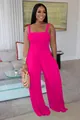 Vibrant pink smocked wide-leg jumpsuit for women, sleeveless casual style detail view - Rose Red