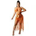 Detail view of a vibrant orange knitted two-piece beach set featuring a long fringe skirt - S / Top And Bottom / Orange