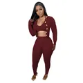 Detail view of wine red 3-piece knitted set featuring a cardigan, crop top, and leggings. - S / Top And Bottom / Burgundy
