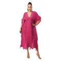 Detail view of a handmade knit fringe maxi dress in vibrant pink with deep V-neckline style - Rose Red