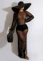 Gros plan d'une robe de plage noire en crochet fait main avec manches longues et franges - S / Noir