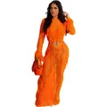 Close-up view of a vibrant orange crochet maxi beach dress with delicate fringe detailing - S / Dresses / Orange