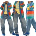 Detail of colorful striped oversized knit cardigan for women showing casual fit - S / Tops / Rainbow Striped