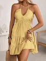Stylish yellow halter V-neck summer dress featuring a tiered ruffle hem in a cozy interior - Lemon Yellow