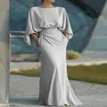 Elegant light gray pleated maxi dress featuring batwing sleeves and functional pockets - S / Silver