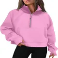 Detailed view of pink half-zip sweatshirt featuring a stand collar and thumbhole sleeves - Pink