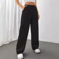 High-waisted black wide-leg sweatpants with drawstring waist for a relaxed fit and style. - S / Bottoms / Black