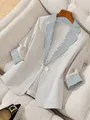 Chic beige women's blazer with classic striped contrast lapels and cuffs in British style - S / Tops / Beige Striped