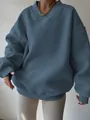 Stylish blue oversized V-neck sweatshirt for women featuring casual drop shoulder fit - Dark Blue