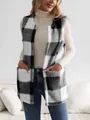 Women's stylish black and white plaid fuzzy vest with front pockets in a loose casual fit - S / Tops / Black