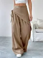 Detailed view of women's camel high-waist irregular wrap-front wide-leg suit trousers - S / Bottoms / Khaki