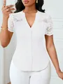 Detailed view of white lace hollow short-sleeved top with button-front design - S / Tops / White