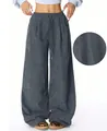 Detail of wide-leg corduroy pants showing deep grey fabric texture and loose fit - S / Bottoms / Gray