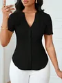 Detailed view of women's black ribbed short sleeve blouse with lace shoulder panels - S / Tops / Black