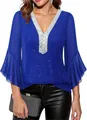 Detail of royal blue V-neck top featuring silver sequin trim and elegant bell sleeves. - S / Tops / Blue
