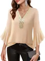 Detailed view of women's deep V-neck top with golden sequins and flared sleeves - Apricot